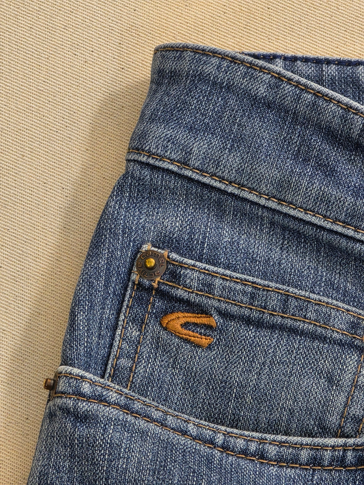 Spodnie jeansowe Camel Active vintage light bootcut roz. 31/34